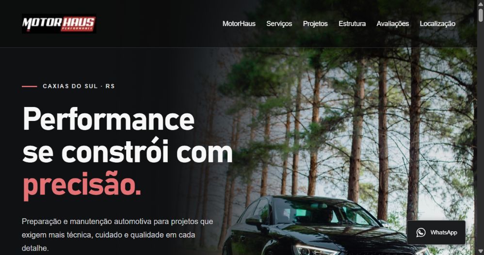 Captura real do site MotorHaus: hero escuro, tipografia vermelha e branca e um Audi entre árvores.